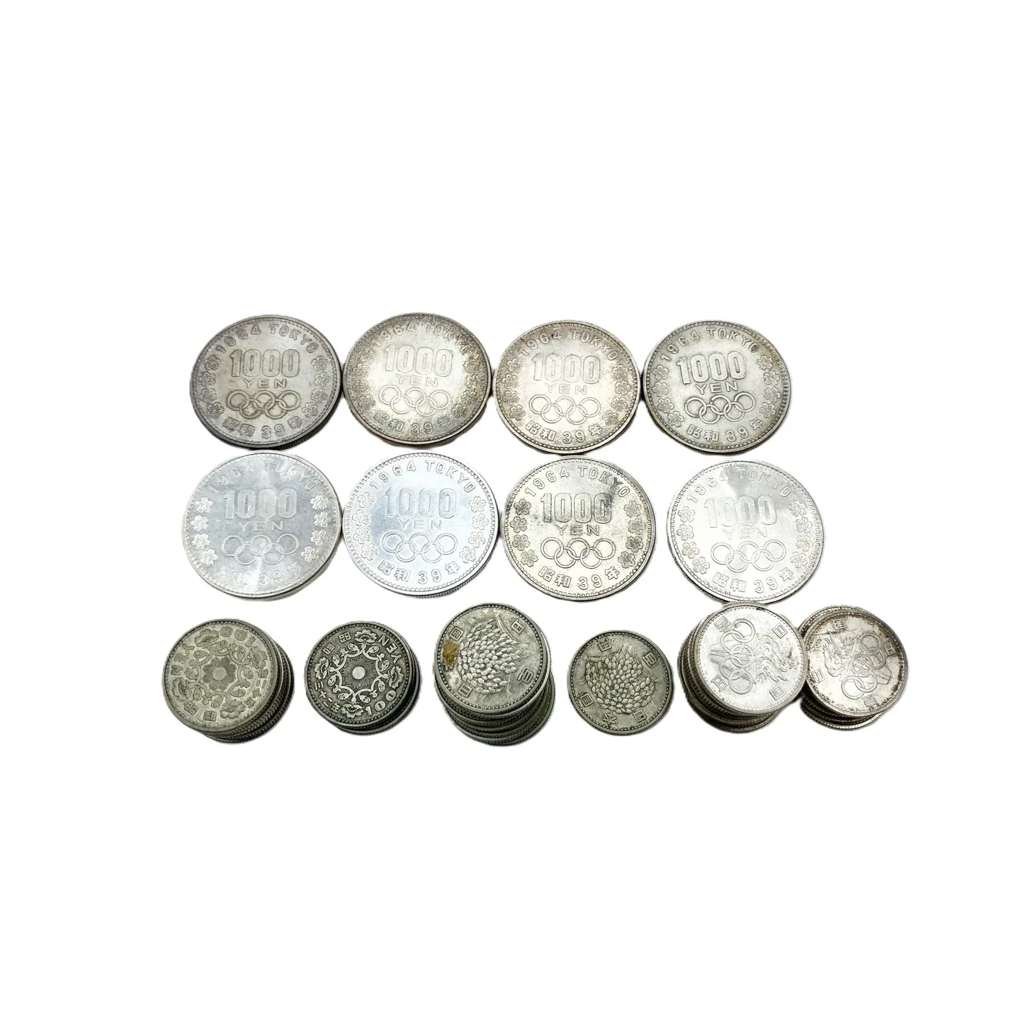 1000円銀貨と100円銀貨のお買取りをさせていただきました...